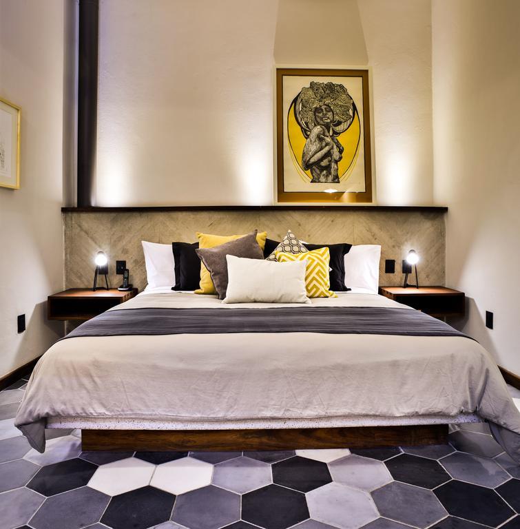 Hotel Criol Querétaro Exteriér fotografie A bedroom at the hotel